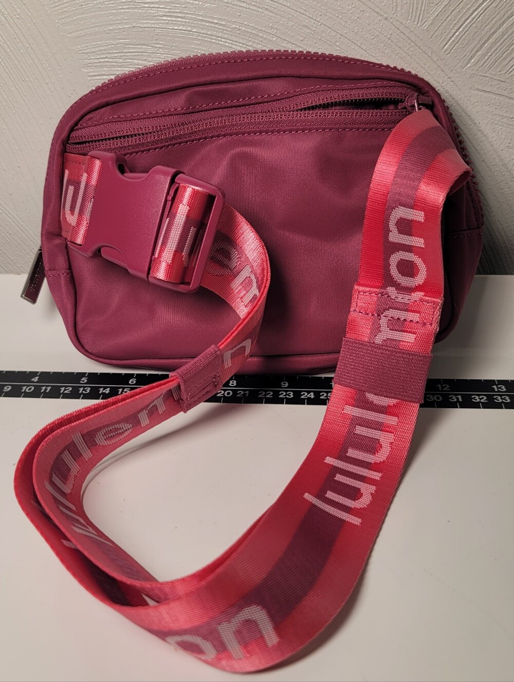 NWOT. Lululemon Maroon and Pink Everywhere Belt Bag.